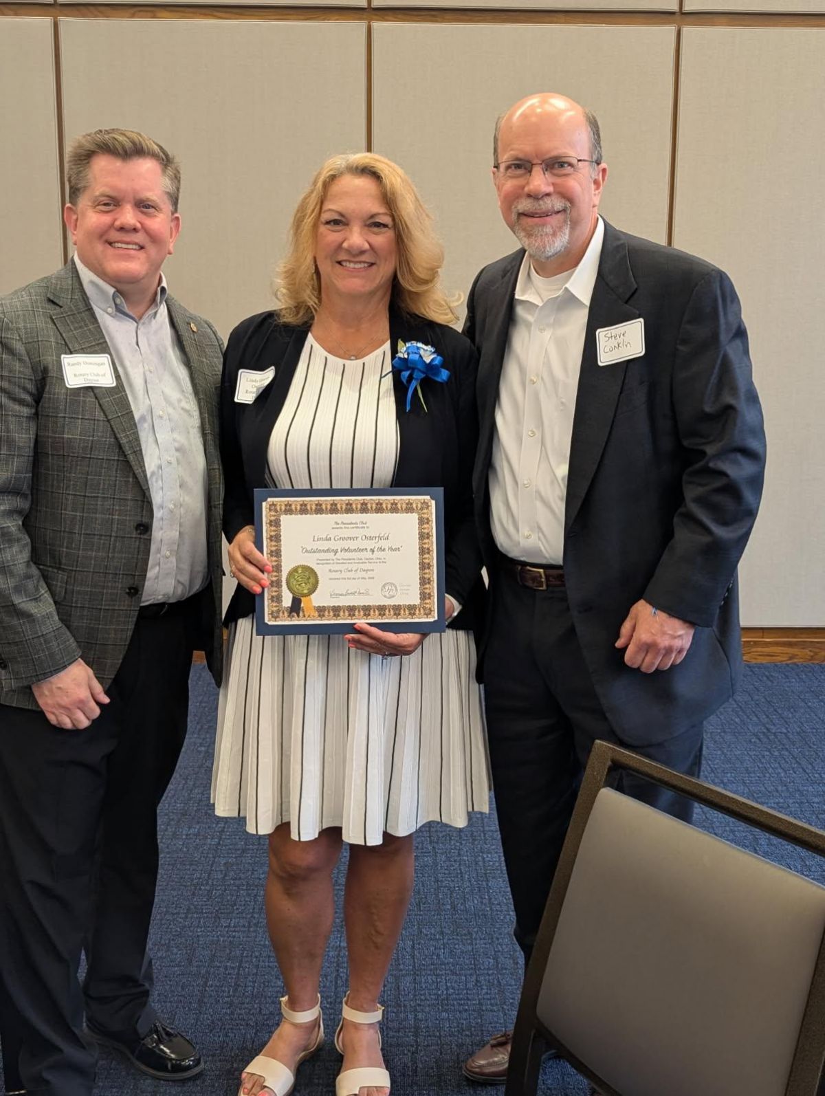 Linda Osterfeld recognized as Volunteer of the Year, pictured with Randy Domigan and Steve Conklin