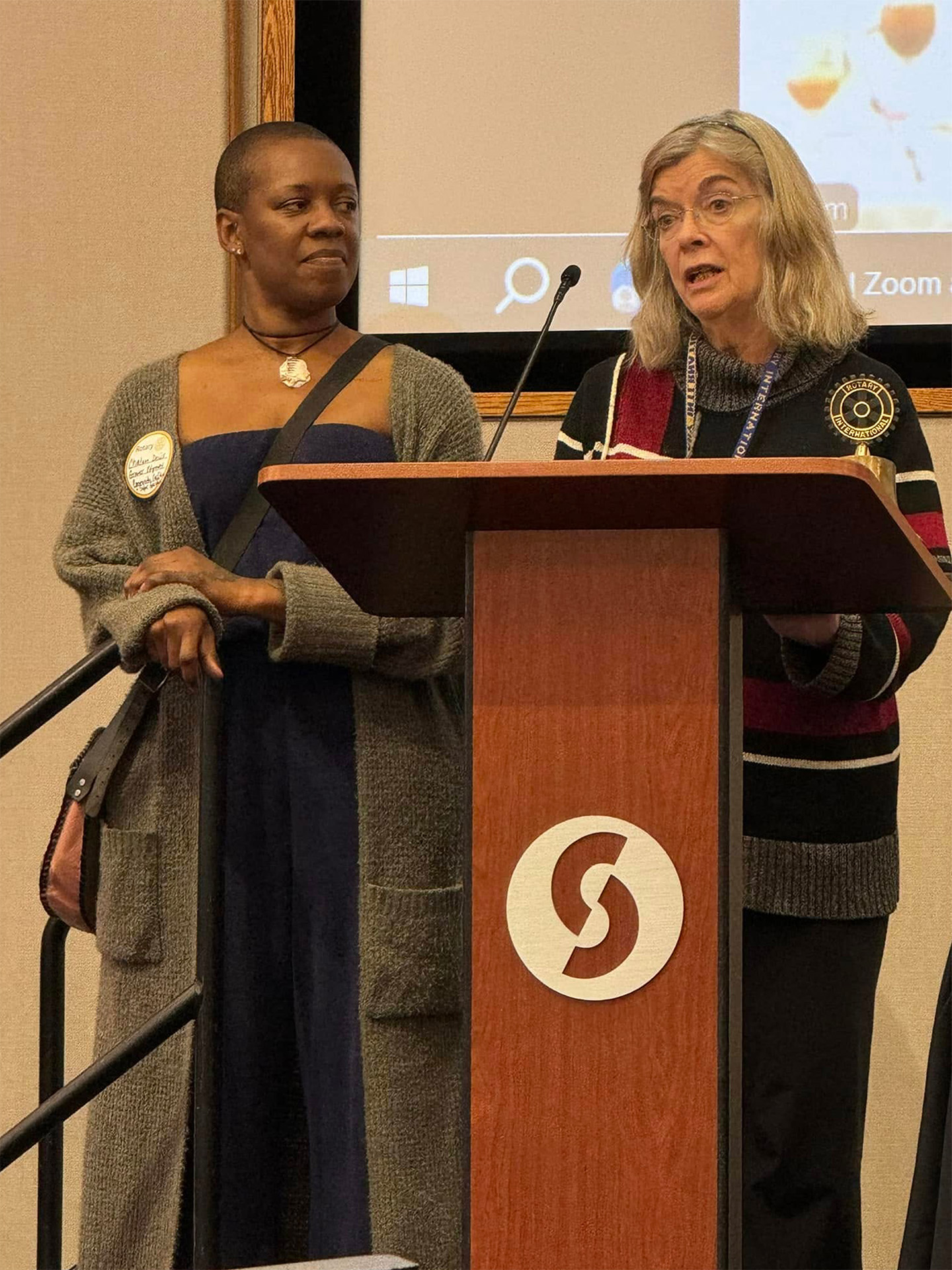 Foundation Trustee Sue Taylor presents an Impact Grant at a Rotary Club of Dayton meeting.