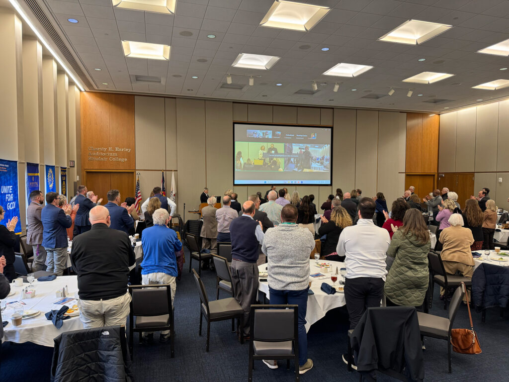 Attendees honored Dr. Ponitz with a standing ovation for his years of service.