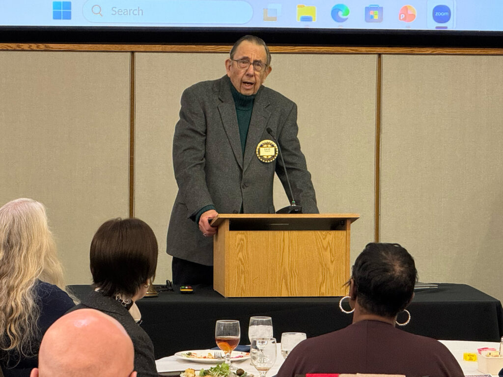 David H. Ponitz addresses a packed room in the building that bears his name.