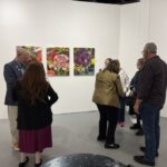 Attendees enjoy May's Rotary Revealed at Front Street