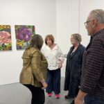 Attendees enjoy May's Rotary Revealed at Front Street